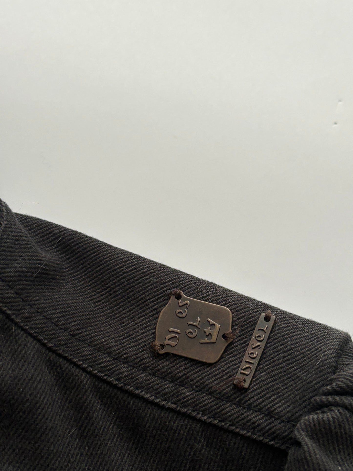 Black diesel metal button jacket