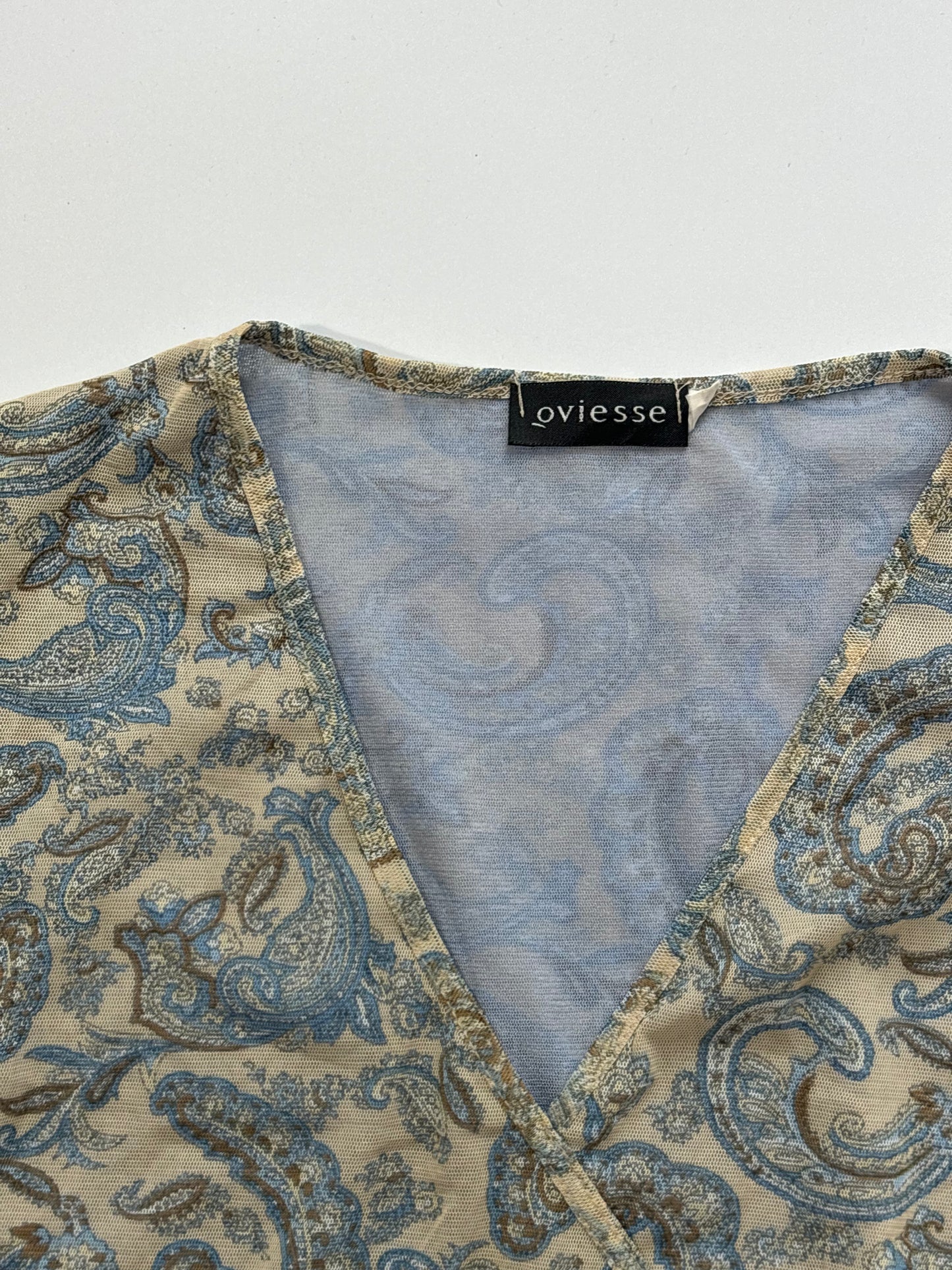 long sleeve cream whimsical top