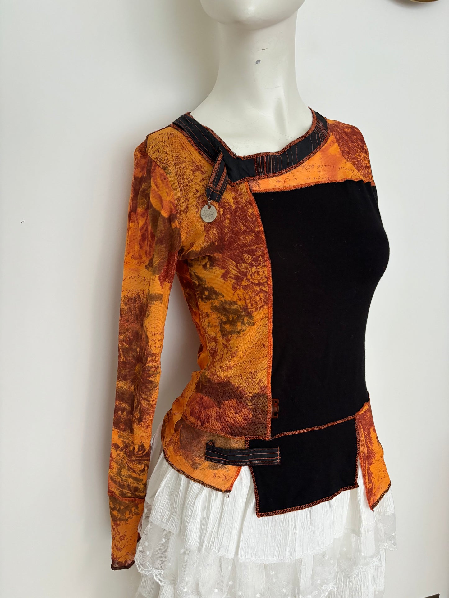 orange long sleeve asymmetrical top